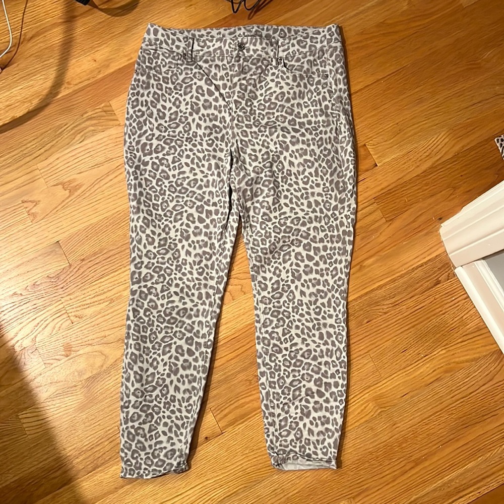 White House Black Market size 12 snow leopard coated Jean.